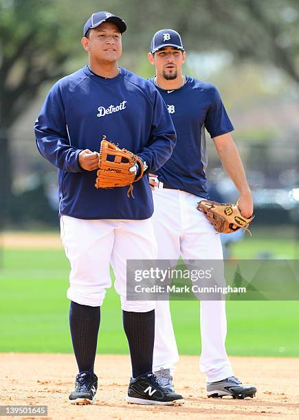 Miguel Cabrera and Nick Castellanos of the Detroit Tigers look on during Spring Training workouts at the TigerTown Facility on February 21, 2012 in...