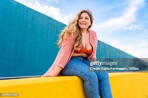 beautiful plus size young woman outdoors - plus size fashion stock pictures, royalty-free photos & images