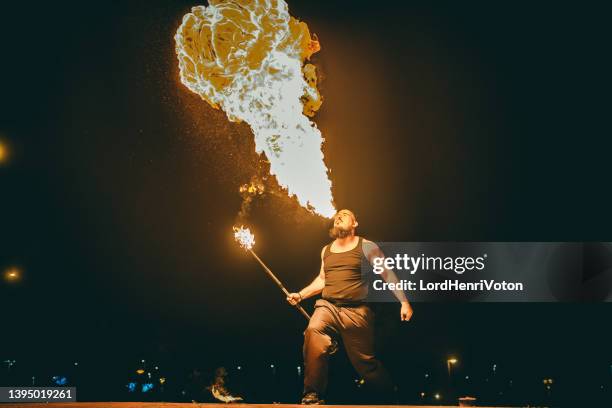 fire breather blowing fire - passion bildbanksfoton och bilder