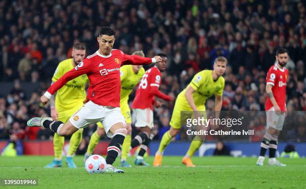 Cristiano Ronaldo of Manchester United scores their side's second goal from a penalty during the Premier League match between Manchester United and...