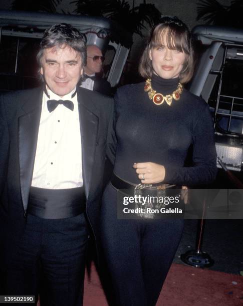 Actor Dudley Moore and wife Brogan Lane attend the "Celebration of Tradition" A Gala Event Gathering Warner Bros. Stars on June 2, 1990 at Warner...