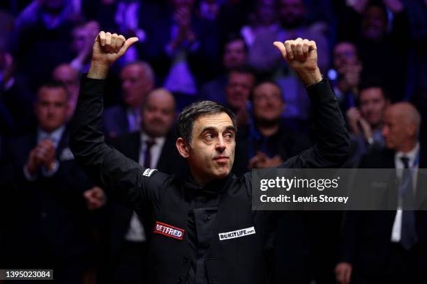 Ronnie O'Sullivan of England celebrates victory in the Betfred World Snooker Championship Final match between Judd Trump of England and Ronnie...