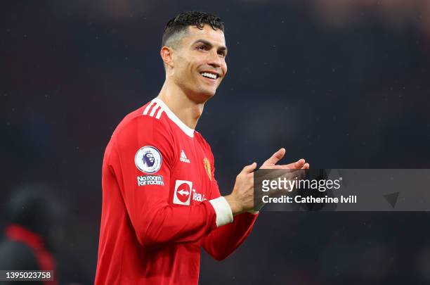 Cristiano Ronaldo of Manchester United applauds their fans after the final whistle of the Premier League match between Manchester United and...