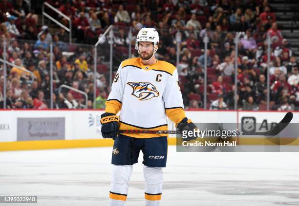 Roman Josi of the Nashville Predators gets ready during a face off against the Arizona Coyotes at Gila River Arena on April 29, 2022 in Glendale,...
