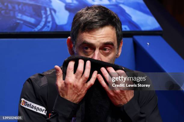 Ronnie O'Sullivan of England reacts after victory in the Betfred World Snooker Championship Final match between Judd Trump of England and Ronnie...