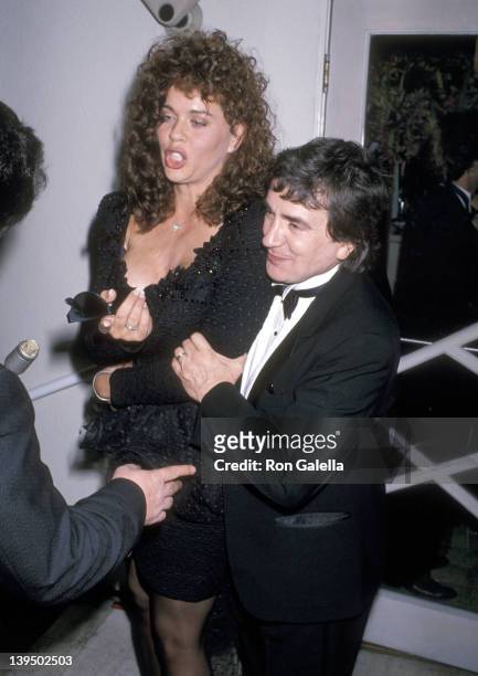 Actor Dudley Moore and wife Brogan Lane attend the 61st Annual Academy Awards After Party Hosted by Irving "Swifty" Lazar on March 29, 1989 at Spago...