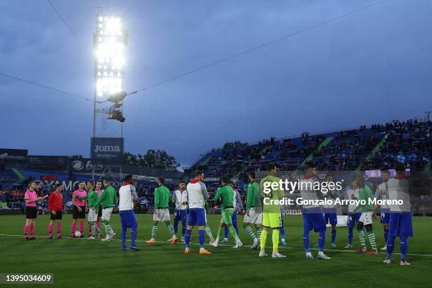 Getafe players make a corridor to Real Betis players to congratulate them for their Copa del Rey trophy prior to start the LaLiga Santander match...