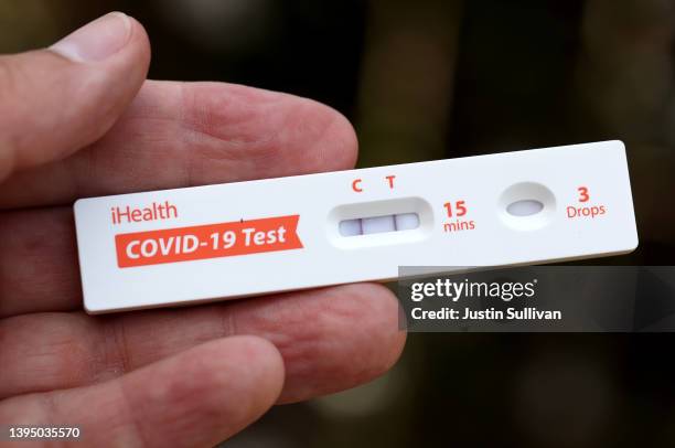 Positive Covid-19 at home test is displayed on May 02, 2022 in San Anselmo, California. Covid cases are on the rise across most of the United States...