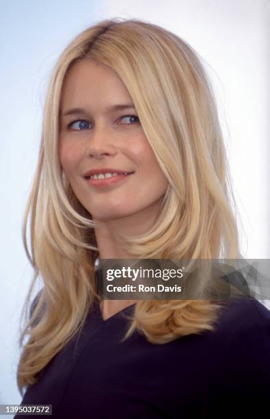 German model and actress Claudia Schiffer, poses at a photocall for L'oreal products, on the rooftop of the Palais des Festivals during the Cannes...