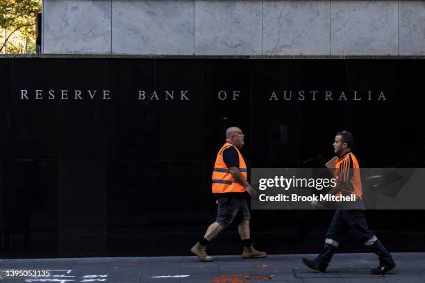 Pedestrians walk past the Reserve Bank of Australia building in Martin Place in Sydney on May 03, 2022 in Sydney, Australia. The Reserve Bank of...