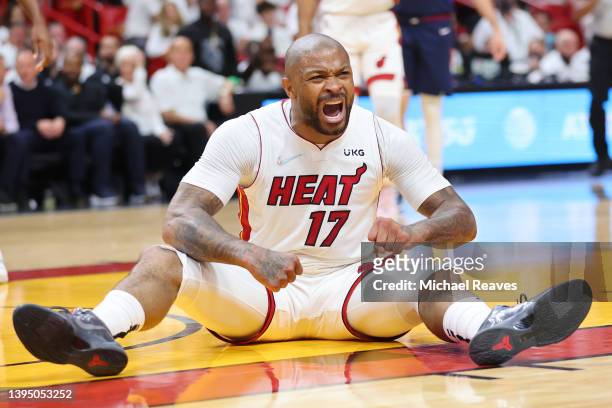 Tucker of the Miami Heat celebrates a basket and a foul against the Philadelphia 76ers during the second half in Game One of the Eastern Conference...