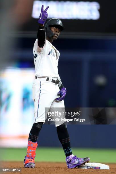 Jazz Chisholm Jr. #2 of the Miami Marlins reacts after hitting a RBI double against the Arizona Diamondbacks during the seventh inning at loanDepot...