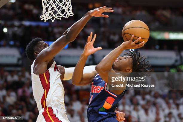 Tyrese Maxey of the Philadelphia 76ers shot is defended by Victor Oladipo of the Miami Heat during the first half in Game One of the Eastern...