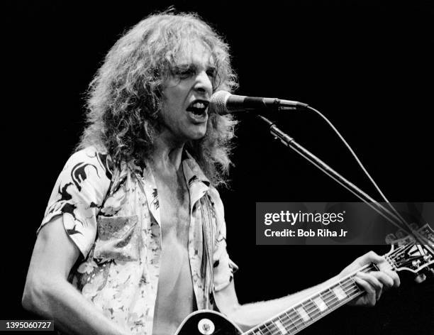 Musician Peter Frampton performs in concert at the Forum, December 7, 1976 in Inglewood, California.