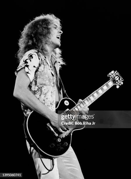 Musician Peter Frampton performs in concert at the Forum, December 7, 1976 in Inglewood, California.