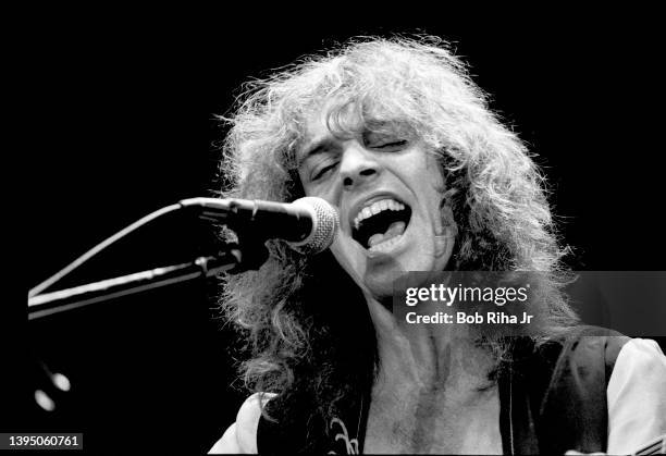 Musician Peter Frampton performs in concert at the Forum, December 7, 1976 in Inglewood, California.