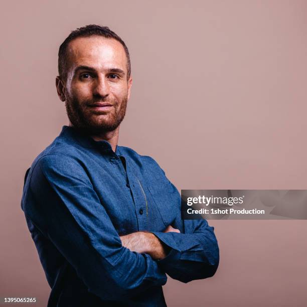 middle east man portrait, confidence. - man medium shot stock pictures, royalty-free photos & images