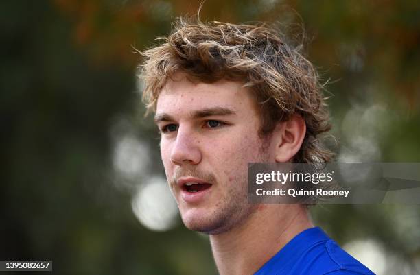 Jason Horne-Francis of the Kangaroos speaks to the mediduring a North Melbourne Kangaroos AFL training session at Arden Street Ground on May 03, 2022...