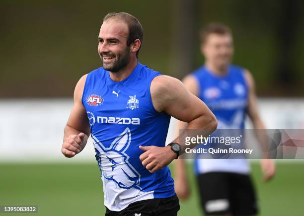 Ben Cunnington of the Kangaroos runs laps during a North Melbourne Kangaroos AFL training session at Arden Street Ground on May 03, 2022 in...