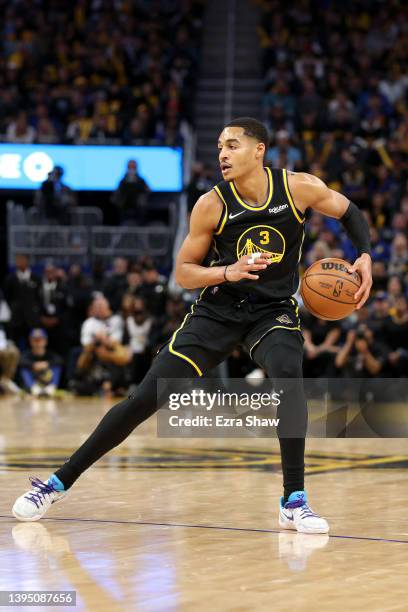 Jordan Poole of the Golden State Warriors in action against the Denver Nuggets during Game Five of the Western Conference First Round NBA Playoffs at...