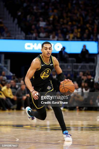 Jordan Poole of the Golden State Warriors in action against the Denver Nuggets during Game Five of the Western Conference First Round NBA Playoffs at...