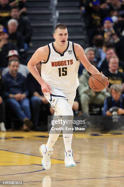 Nikola Jokic of the Denver Nuggets in action against the Golden State Warriors during Game Five of the Western Conference First Round NBA Playoffs at...