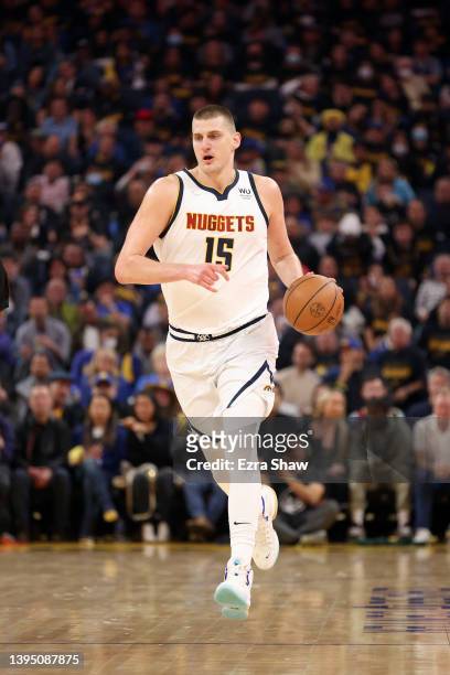 Nikola Jokic of the Denver Nuggets in action against the Golden State Warriors during Game Five of the Western Conference First Round NBA Playoffs at...