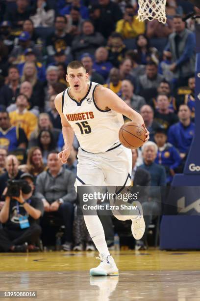 Nikola Jokic of the Denver Nuggets in action against the Golden State Warriors during Game Five of the Western Conference First Round NBA Playoffs at...