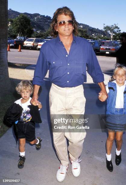 Actor Michael Landon, son Sean Landon and daughter Jennifer Landon attend "The Wizard" Universal City Premiere on December 2, 1989 at Cineplex Odeon...