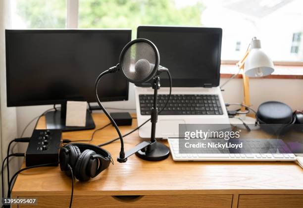 professional home podcast studio setup with microphone and computers on table - makeshift office stock pictures, royalty-free photos & images