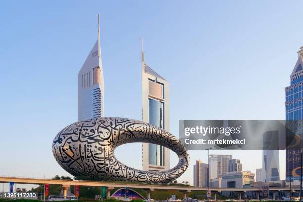 the  museum of the future, dubai, uae - emirates towers stock pictures, royalty-free photos & images