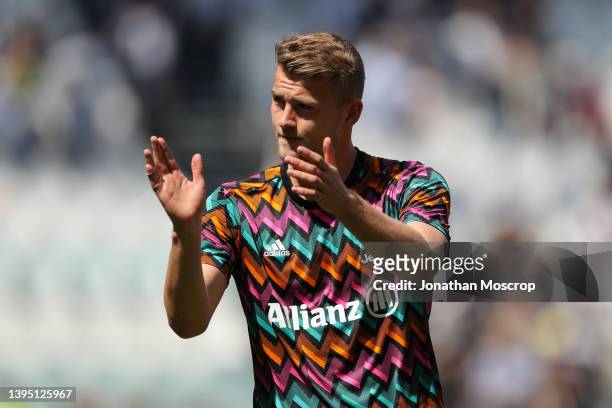 Matthijs De Ligt of Juventus applauds the fans during the warm up prior to the Serie A match between Juventus and Venezia FC at Allianz Stadium on...