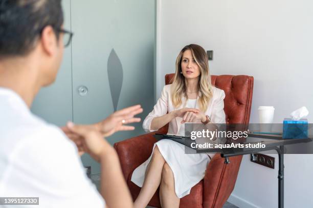 psychologist session with sign language - arts patient stock pictures, royalty-free photos & images