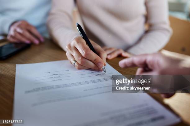 Sign Getting File Hand Signing A Document Photos and Premium High Res Pictures - Getty Images
