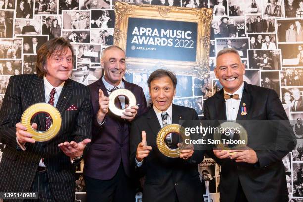 Murray Cook, Greg Page, Jeff Fatt, Anthony Field of the Wiggles pose for a photograph after winning the Ted Albert Award for Outstanding Services to...