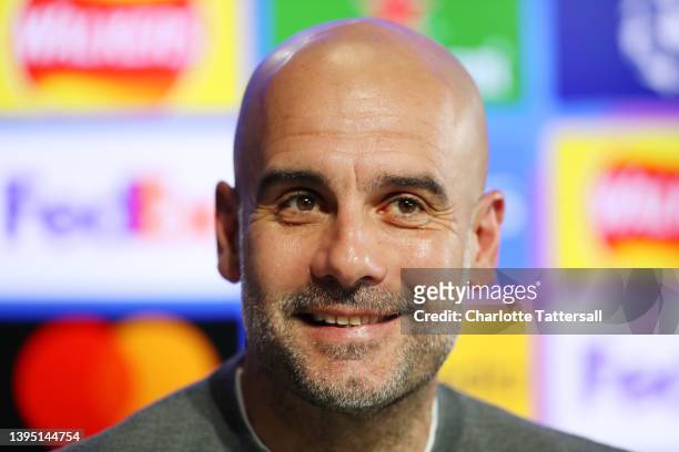Pep Guardiola, Manager of Manchester City looks on during a press conference at Manchester City Football Academy on May 03, 2022 in Manchester,...