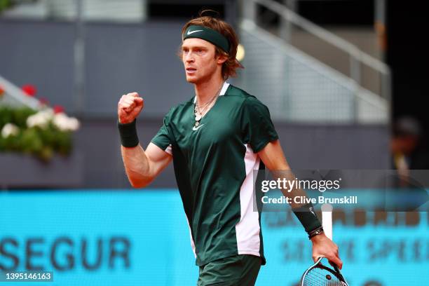 Andrey Rublev celebrates match point in their second round match against Jack Draper of Great Britain during day six of Mutua Madrid Open at La Caja...