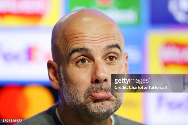 Pep Guardiola, Manager of Manchester City reacts during a press conference at Manchester City Football Academy on May 03, 2022 in Manchester,...