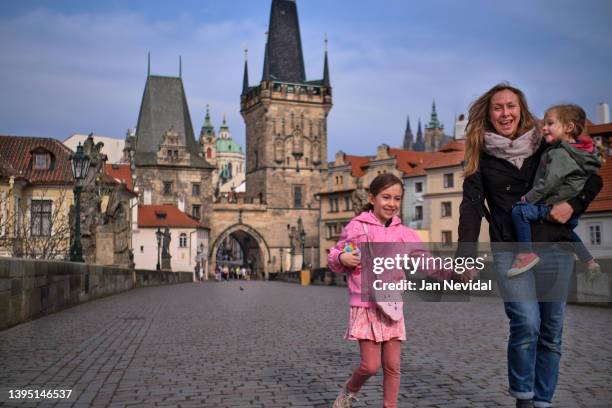 prague vacation experience - walk over charles bridge - charles bridge stock pictures, royalty-free photos & images