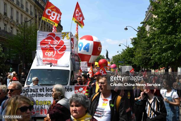 Protesters during the traditional May Day demonstration on May 1, 2022 in Paris, France.