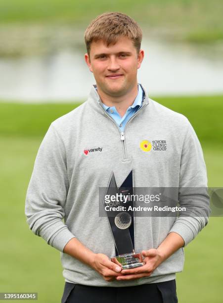 Kipp Popert of England poses with the trophy after winning G4D @ the Betfred British Masters hosted by Danny Willett at The Belfry on May 03, 2022 in...