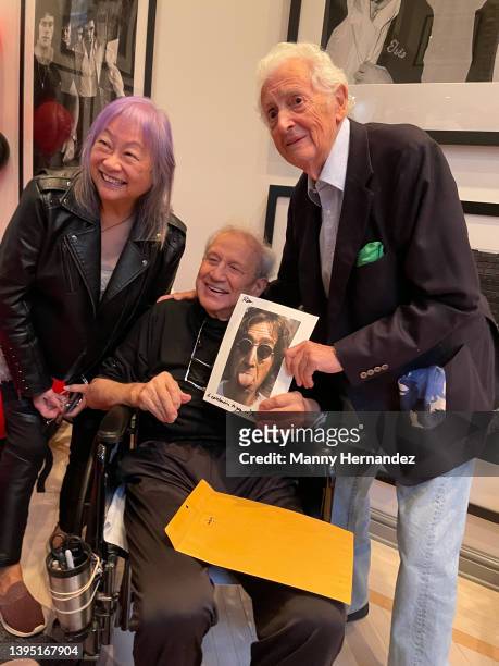 May Pang, Ron Galella and Harry Benson at Ron's 90th birthday party at his home in Montville, New Jersey on October 23, 2021.