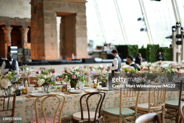 View of table settings at The 2022 Met Gala Celebrating "In America: An Anthology of Fashion" at The Metropolitan Museum of Art on May 02, 2022 in...