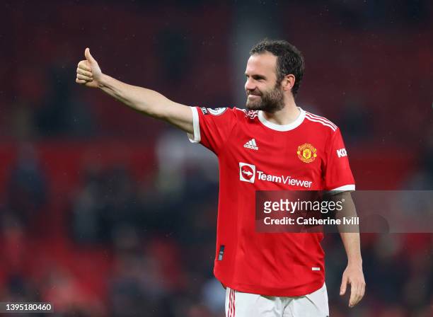 Juan Mata of Manchester United gives the fans a thumbs up at the end of the Premier League match between Manchester United and Brentford at Old...