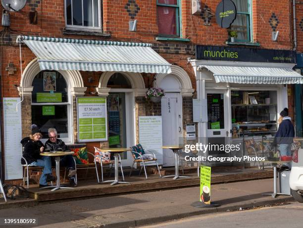 Munchies cafe restaurant Aldeburgh, Suffolk, England, UK people sitting outside.