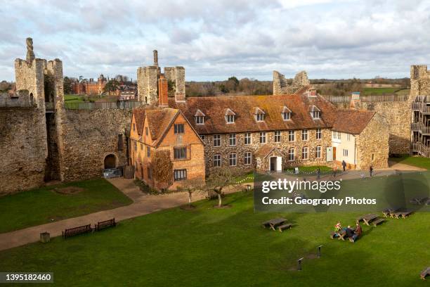 View from wall over interior of castle, Framlingham, Suffolk, England, UK - Framlingham College in background.