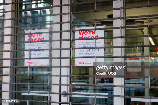 Gated business with a We are Closed sign, lack of business during pandemic, New York City.