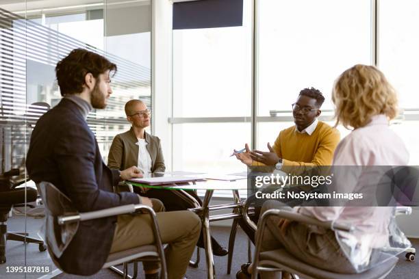 signing contract. investor and contractor - shareholders meeting stock pictures, royalty-free photos & images