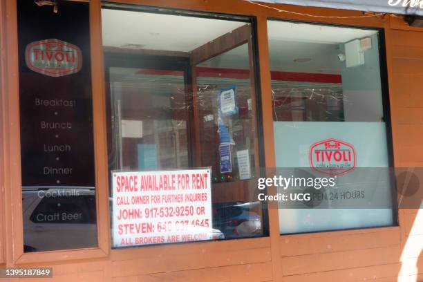 Tivoli restaurant closed, Space available sign in window, Gramercy Park, New York City.