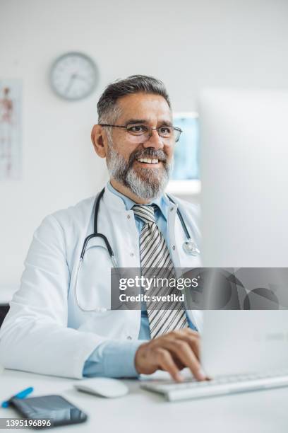 Male Gp Using Computer Photos and Premium High Res Pictures - Getty Images